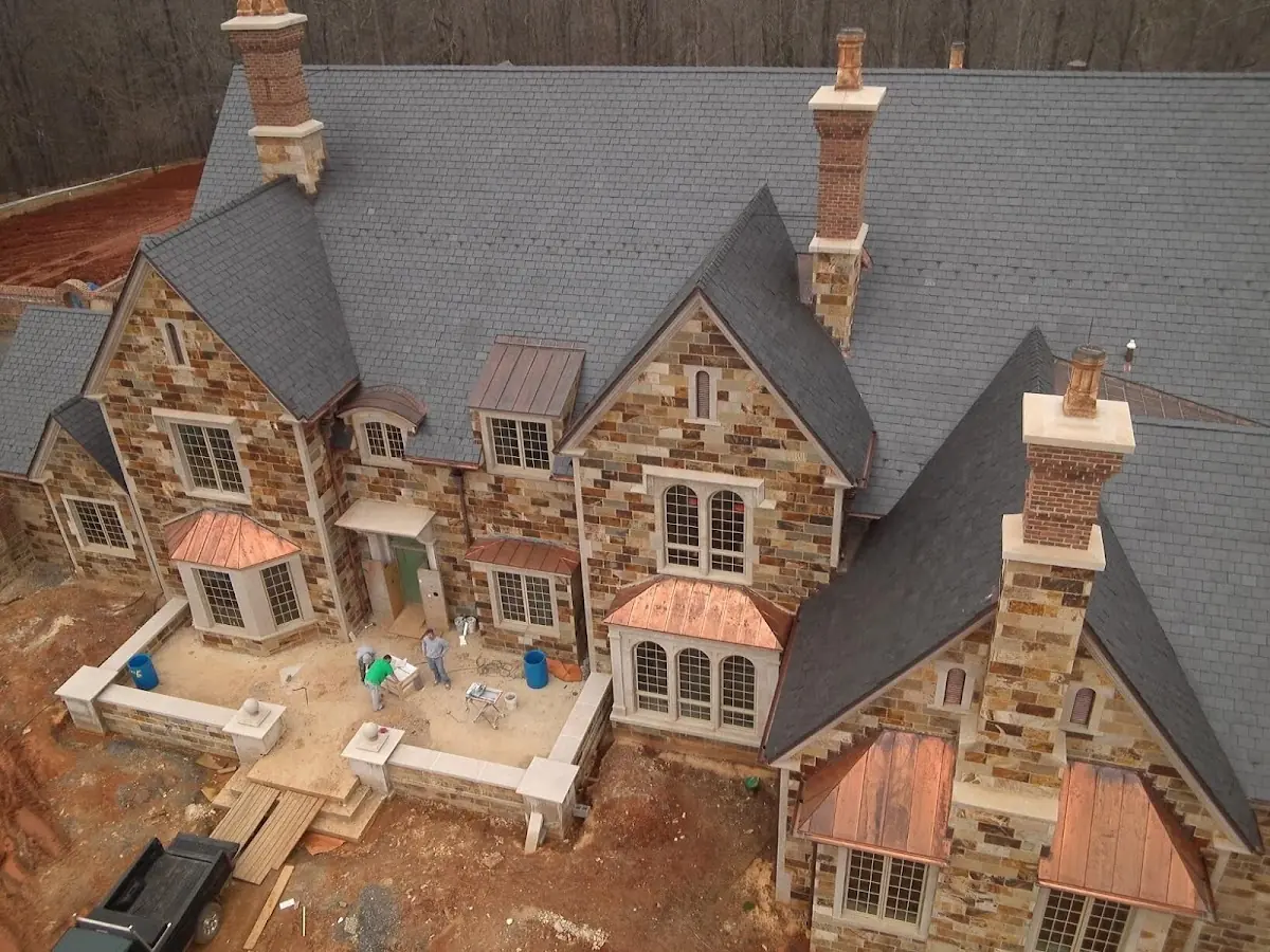 Craftsman Roofing Slate Roof Repair project in Fieldstream
